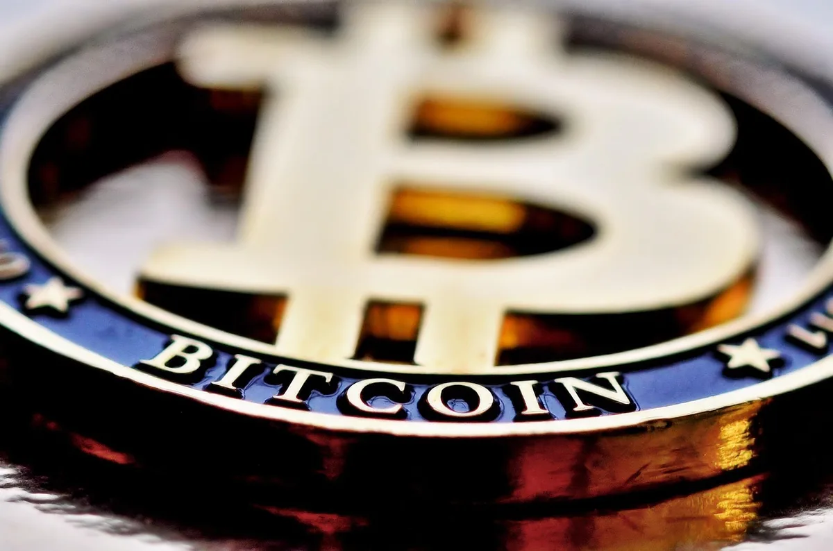 Illustration for: Bitcoin Slips Below $80,000 as Tech Selloff and Hawkish Fed Hold Trigger Liquidations