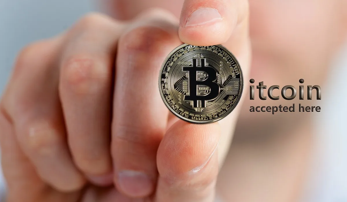 Illustration for: Bitcoin Hits Six-Week Low and Crypto Stocks Slide as Binance Targets Sunday Withdrawal Restart