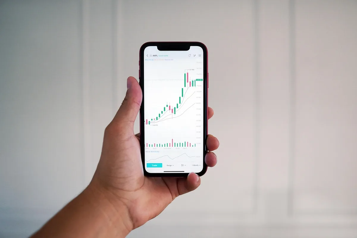 Illustration for: Robinhood Shares Slide After Crypto Slump Drives Third-Quarter Profit Miss